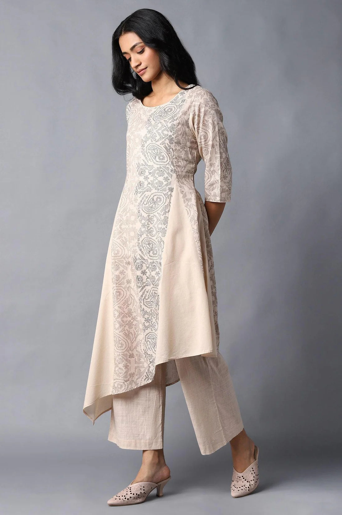 Beige Colour Blocked Asymmetric kurta In Floral Print And Round Neck