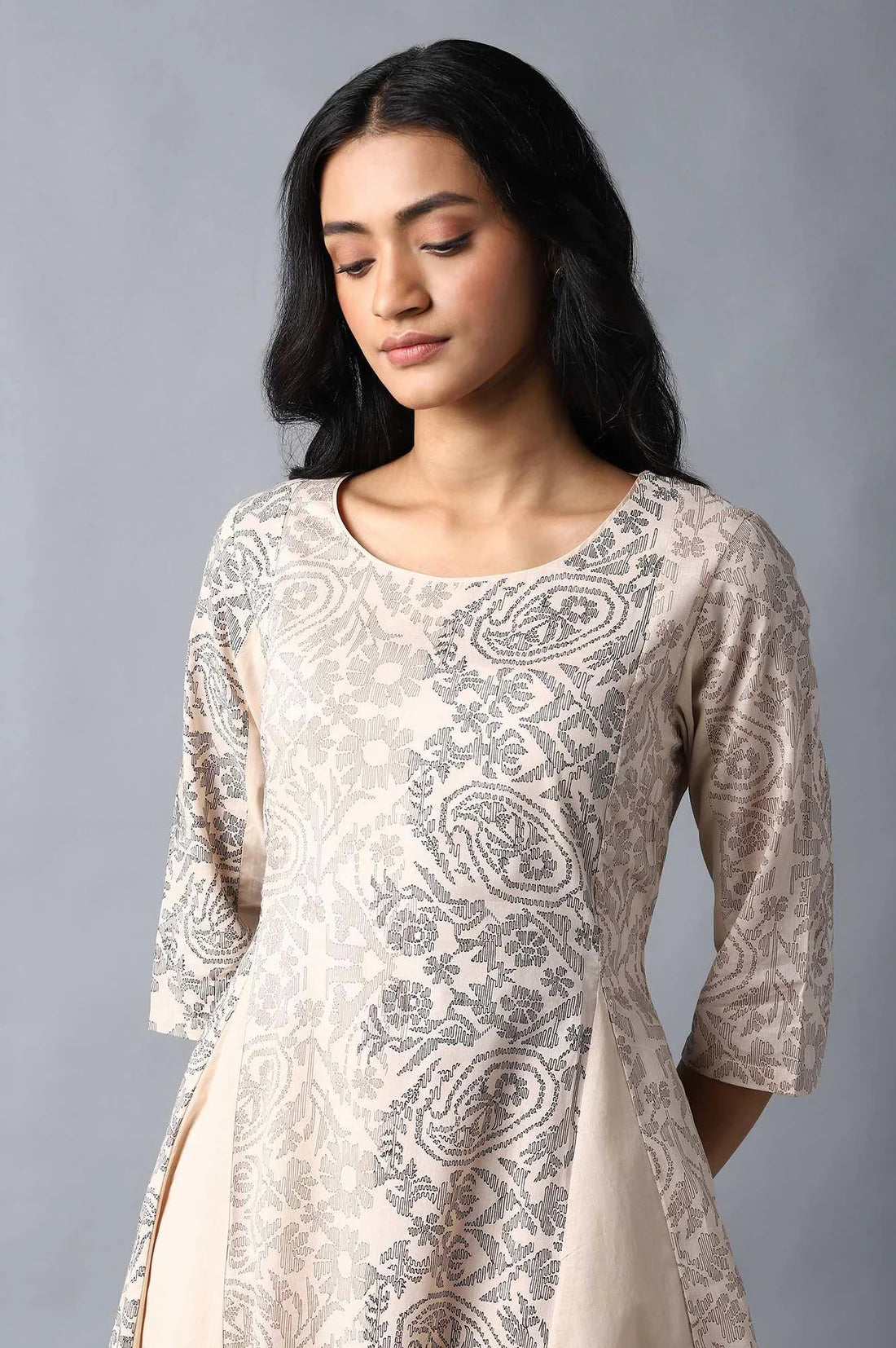 Beige Colour Blocked Asymmetric kurta In Floral Print And Round Neck